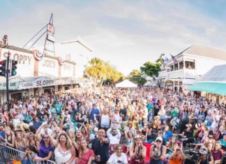 Songwriters Fest Hits Key West with Free Show by Brad Paisley - A group of people standing in front of a crowd - Key West