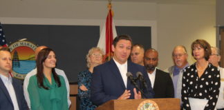 Gov. DeSantis arrives in Marathon with promises of $56 million in funds - Ron DeSantis, Ken Lawson posing for a photo - Ron DeSantis