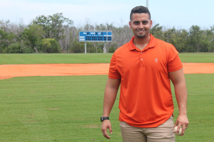Gonzalez promoted to MHS varsity baseball coach - A man standing on a baseball field - Florida Keys