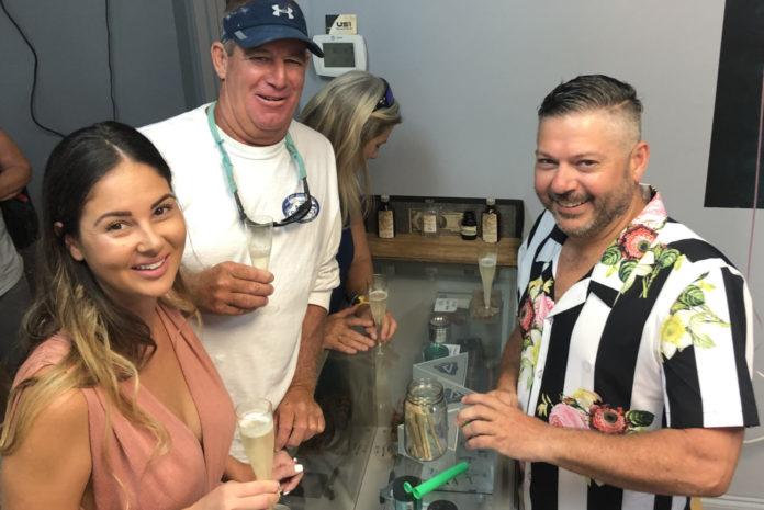New shop in Marathon aims to introduce the beneficial side of CBD - A group of people standing next to a person - Marathon