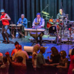 90 miles closer – Havana Nights Heats up the Stage at Key West Theater - A group of people sitting on a stage - Concert