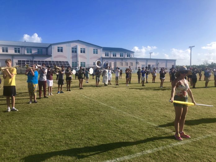 Putting the Band Back Together – KWHS Marching Band prepares for the field - A group of people playing frisbee in a park - Florida Keys