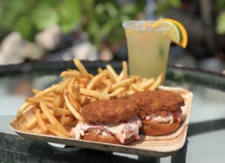 Consider the Lobster Roll – The Good, the Better and the Best - A close up of a sandwich and fries on a table - French fries