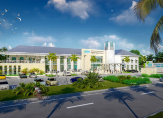 Work underway at college’s new Upper Keys Center - A road with palm trees and a building