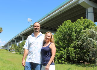 A person standing posing for the camera - Tree