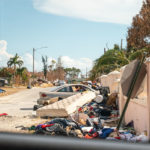 Keys Weekly photographer documents Bahamas plight - A person standing in front of a building - Florida Keys