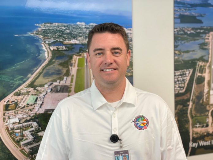 Erick D’Leon starts as new Assistant Director of Airports for Key West, Marathon - A man standing in front of a body of water - Tourism