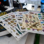 CELEBRATING CONSERVATION DECK: REEF Fest brings education, adventure - A stack of flyers on a table - Art