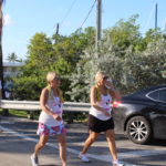 PINK ARMY – Inaugural bra walk in Key Largo sees large support - A young girl in a parking lot - Marathon