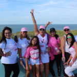PINK ARMY – Inaugural bra walk in Key Largo sees large support - A group of people posing for the camera - Social group