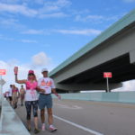 PINK ARMY – Inaugural bra walk in Key Largo sees large support - A man riding a skateboard up the side of a building - Lane
