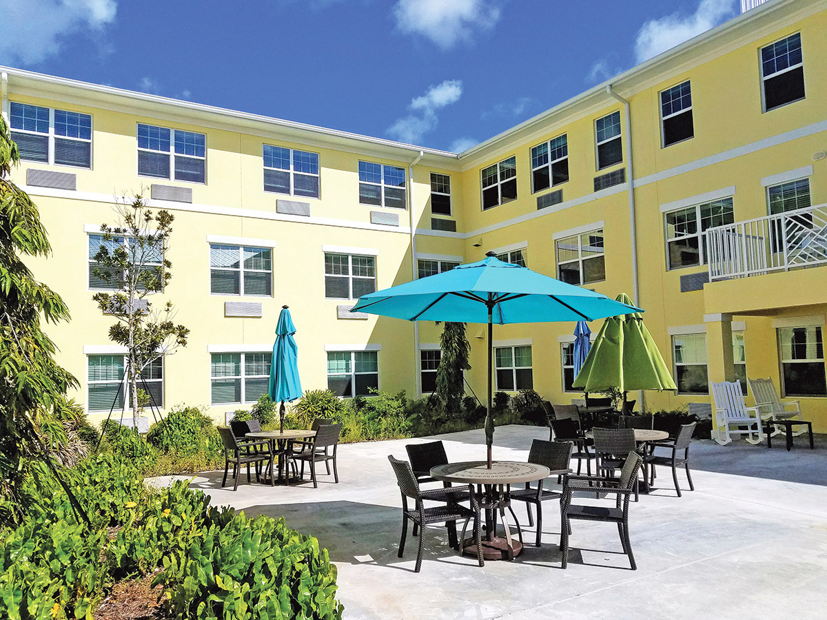 A courtyard in the middle of the Poinciana Gardens independent and assisted-living apartments welcomes residents to enjoy the shaded outdoors and is used for many of the activities planned by Activities Director Shathi Islam. MANDY MILES/ Keys Weekly
