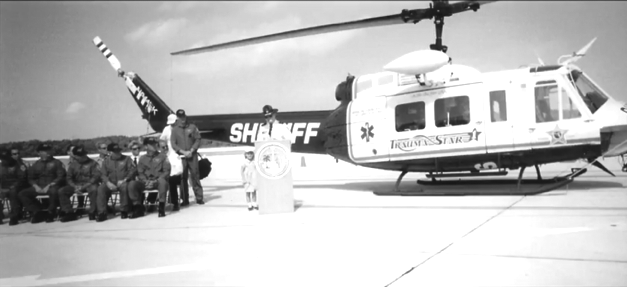 FORMER SHERIFF RICK ROTH LEAVES LASTING LEGACY - A group of people riding on the back of a truck - Helicopter rotor