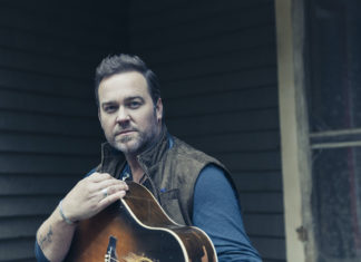 One of music’s biggest stars plays Key West tonight - Lee Brice standing in front of a building - Lee Brice