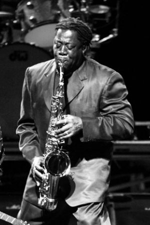Celebrating 20 years: Marathon’s roots traced back to property rights - Clarence Clemons holding a glass of wine - Saxophone