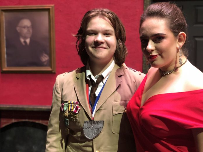 clue2 ‘CLUE’ – MHS drama club stages comedy - A couple of people posing for the camera - STX IT20 RISK.5RV NR EO