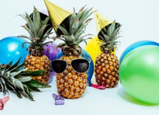 A pineapple sitting on a table - Party