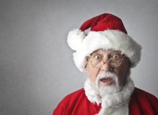 Top 10 worst philanthropic causes this holiday season - A man wearing a red hat - Santa Claus