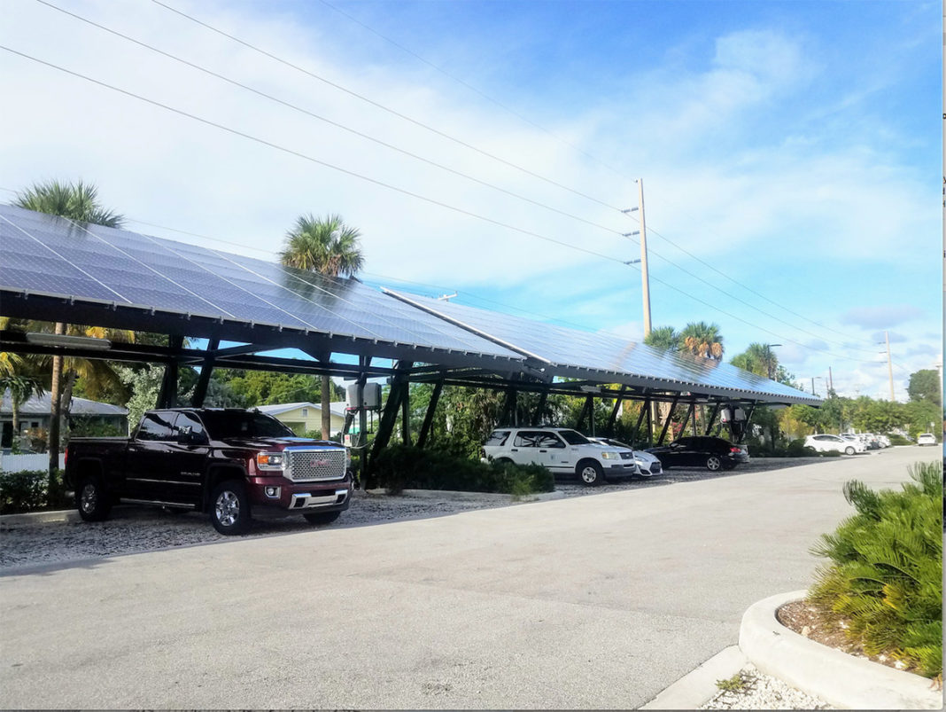 Solar panels save Key West $1,100/month - A car parked on the side of a road - Luxury vehicle