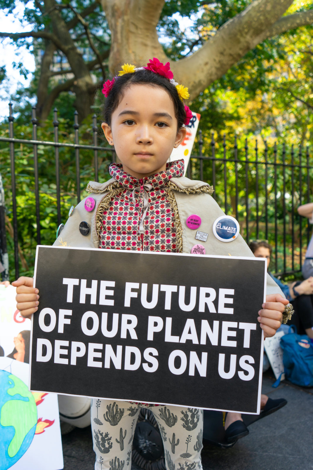 9-year-old Avery Tsai marches as often as possible in climate strikes in her hometown of New York City. TIFFANY DUONG/Keys Weekly