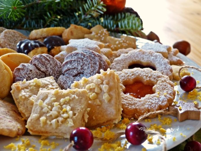 Wine and holiday cookie pairings  - A cake with fruit on top of a table - Christmas cookie
