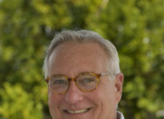 Bogus letter claims Mooney, supporters under investigation - A man wearing glasses and smiling at the camera - Glasses