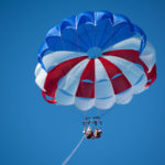 GLIDING INTO SEASON LIKE … - A parachute in the air - Parachuting