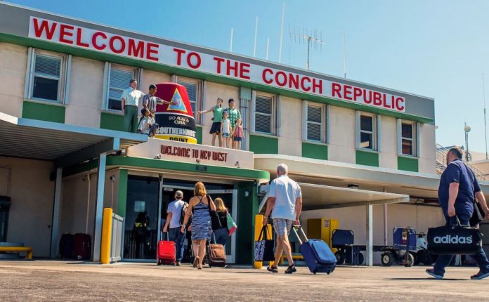 Airport master plan anticipates more plans, passengers - A group of people standing in front of a building - Key West International Airport