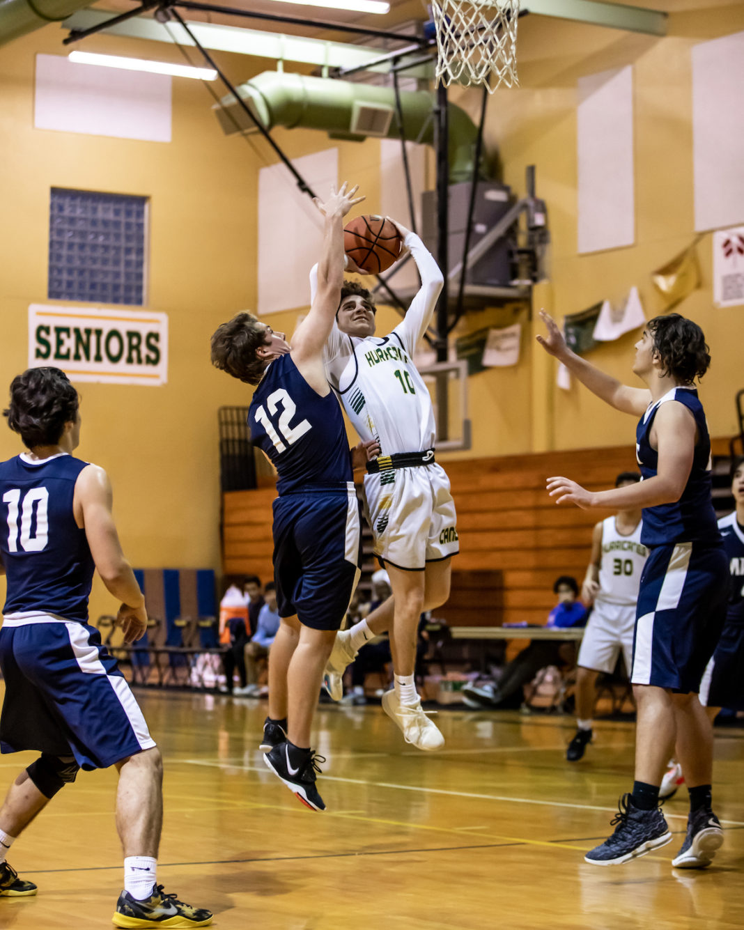 Canes basketball beats MAST Academy