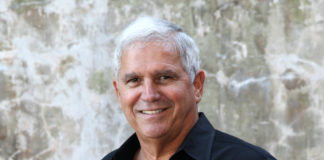 Craig Cates talks about transition from city to county government - A man smiling for the camera - Cow Key Channel