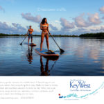 Striking 2020 ads lure various visitors to island chain - A man rowing a boat in a body of water - Florida Keys