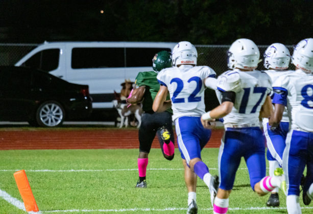 a group of young men playing a game of football