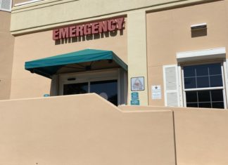 a building with a sign that says emergency