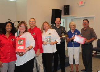 a group of people standing in a room