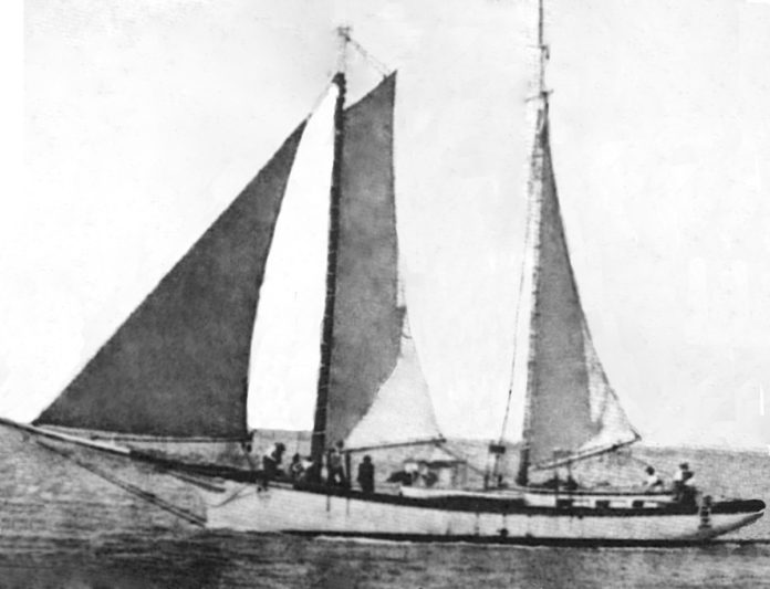 an old photo of a sailboat in the water