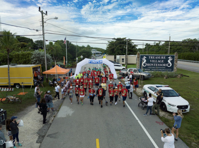 a group of people walking down a street