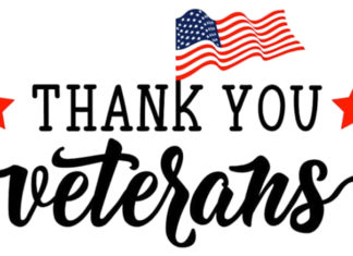 a thank you veterans sign with an american flag