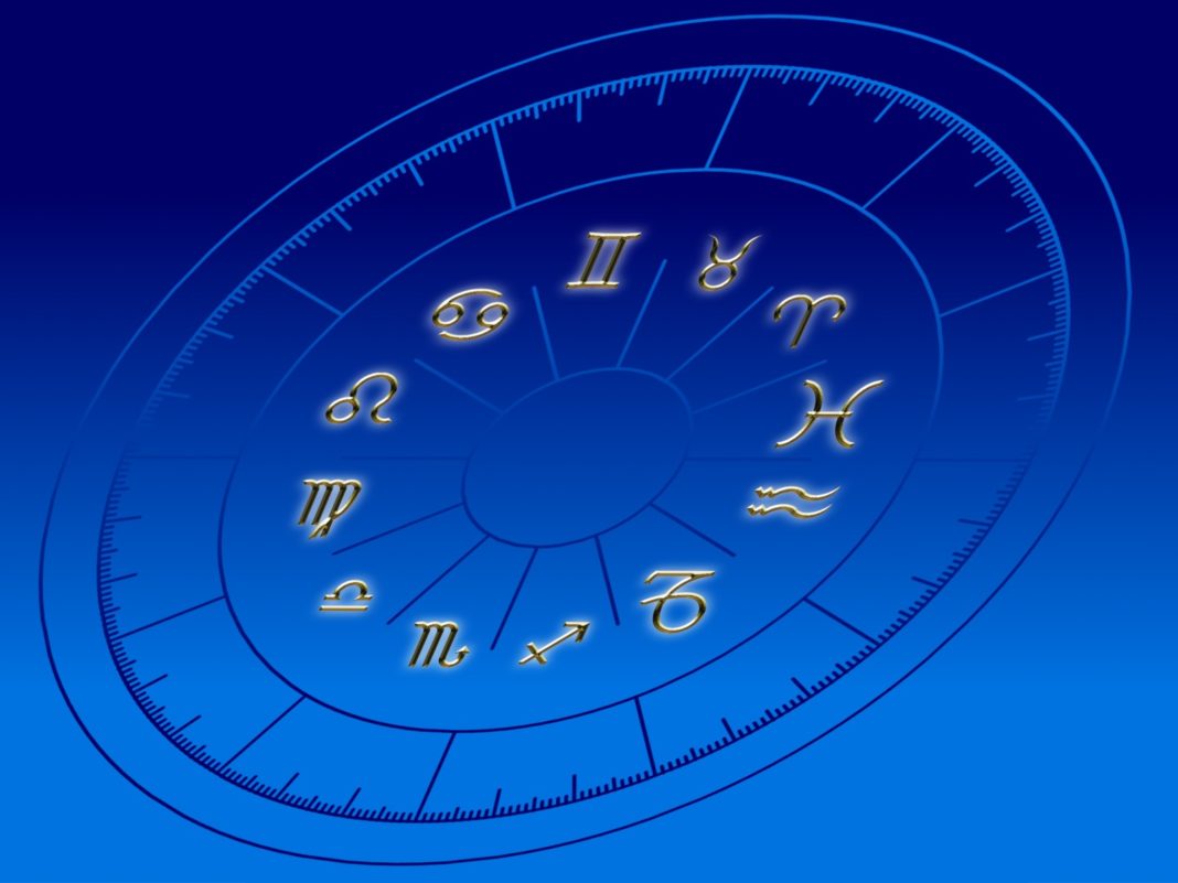 a blue background with zodiac signs and numbers