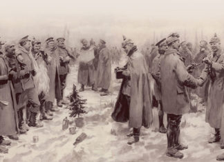 a group of men standing next to each other in the snow