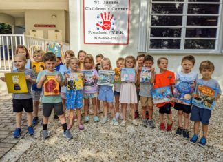 ISLAMORADA’S ST. JAMES CHILDREN’S CENTER LAUNCHES READ-A-THON FUNDRAISER a group of children standing in front of a building