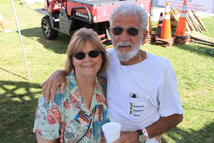 a man and a woman standing next to each other