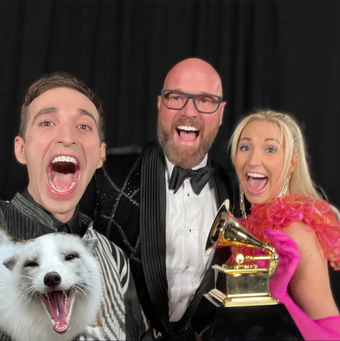 a group of people standing next to each other