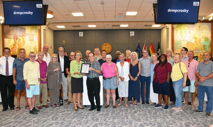 a group of people standing in a room