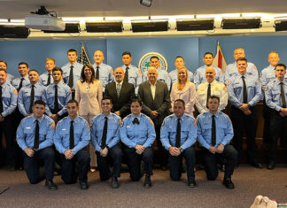 a group of men and women posing for a picture