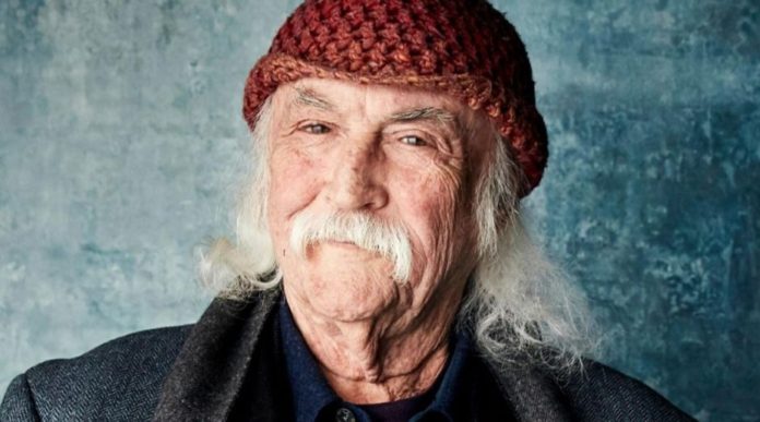 an old man with a beard and a knitted hat
