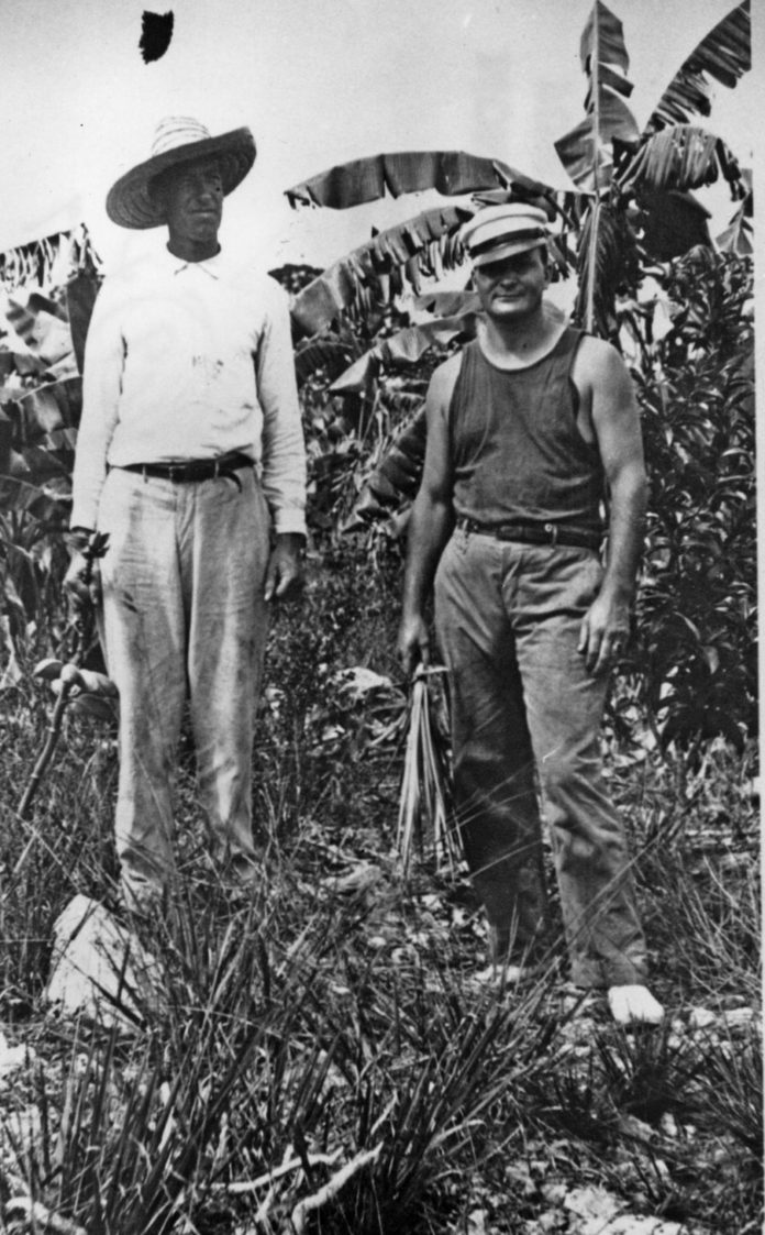 Frank-Doc-Lowe-Marathon-1910-KW-Library a couple of men standing next to each other