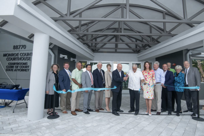 a group of people standing in front of a building