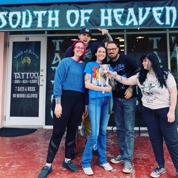 a group of people standing in front of a building