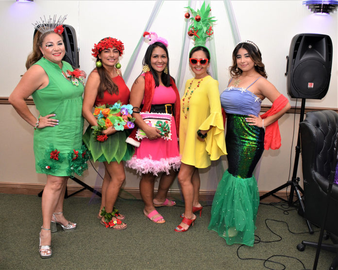 a group of women standing next to each other