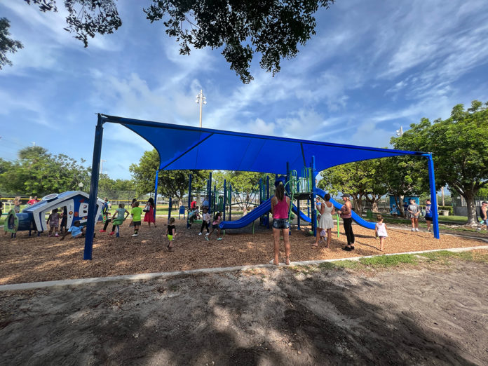 a group of children playing in a park